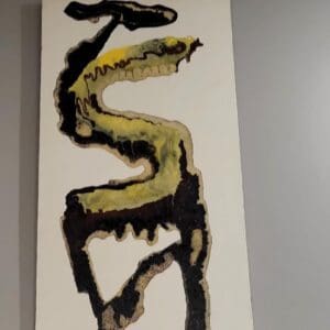 A painting of SNAKE hanging on a wall.