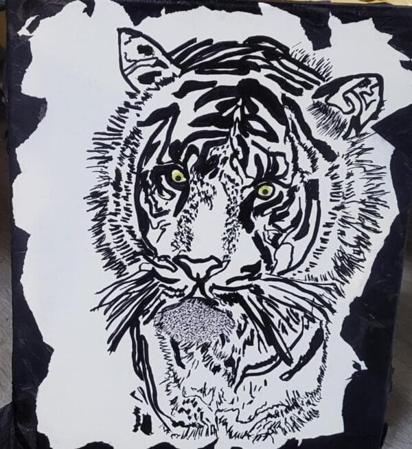 Black and white drawing of a tiger's face.