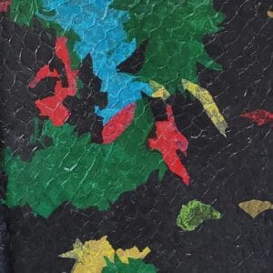 Colorful torn paper collage with black background.