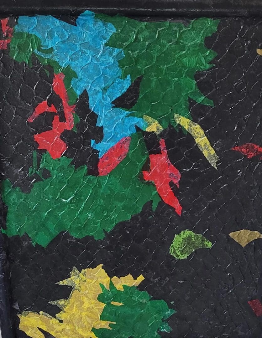 Colorful torn paper collage with black background.